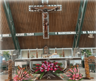 The altar and crucifix inside the open-air Holy Cross Cathedral, Honiara